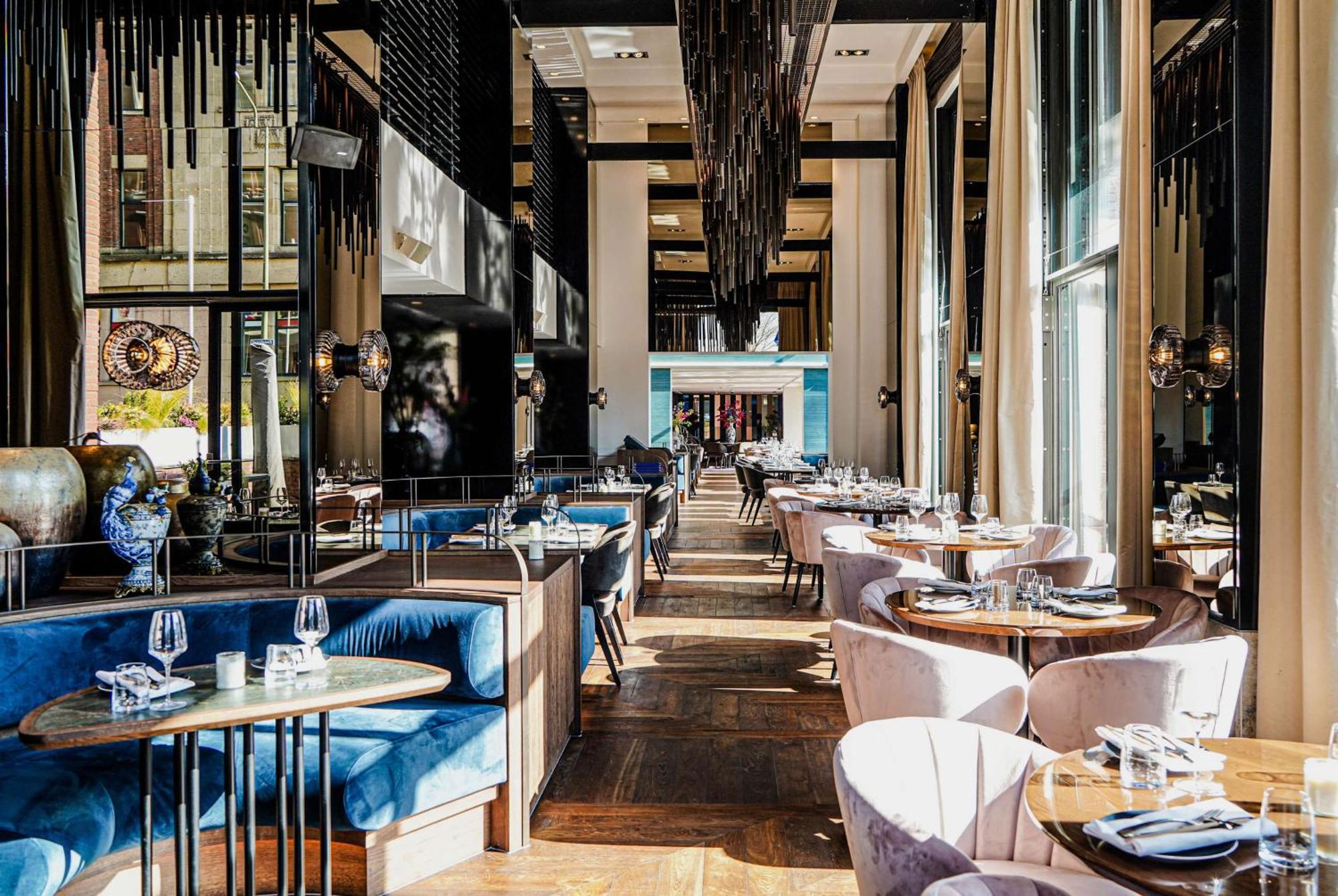 ฮิลตัน เดอะ เฮก Hotel กรุงเฮก ภายนอก รูปภาพ The interior of the restaurant