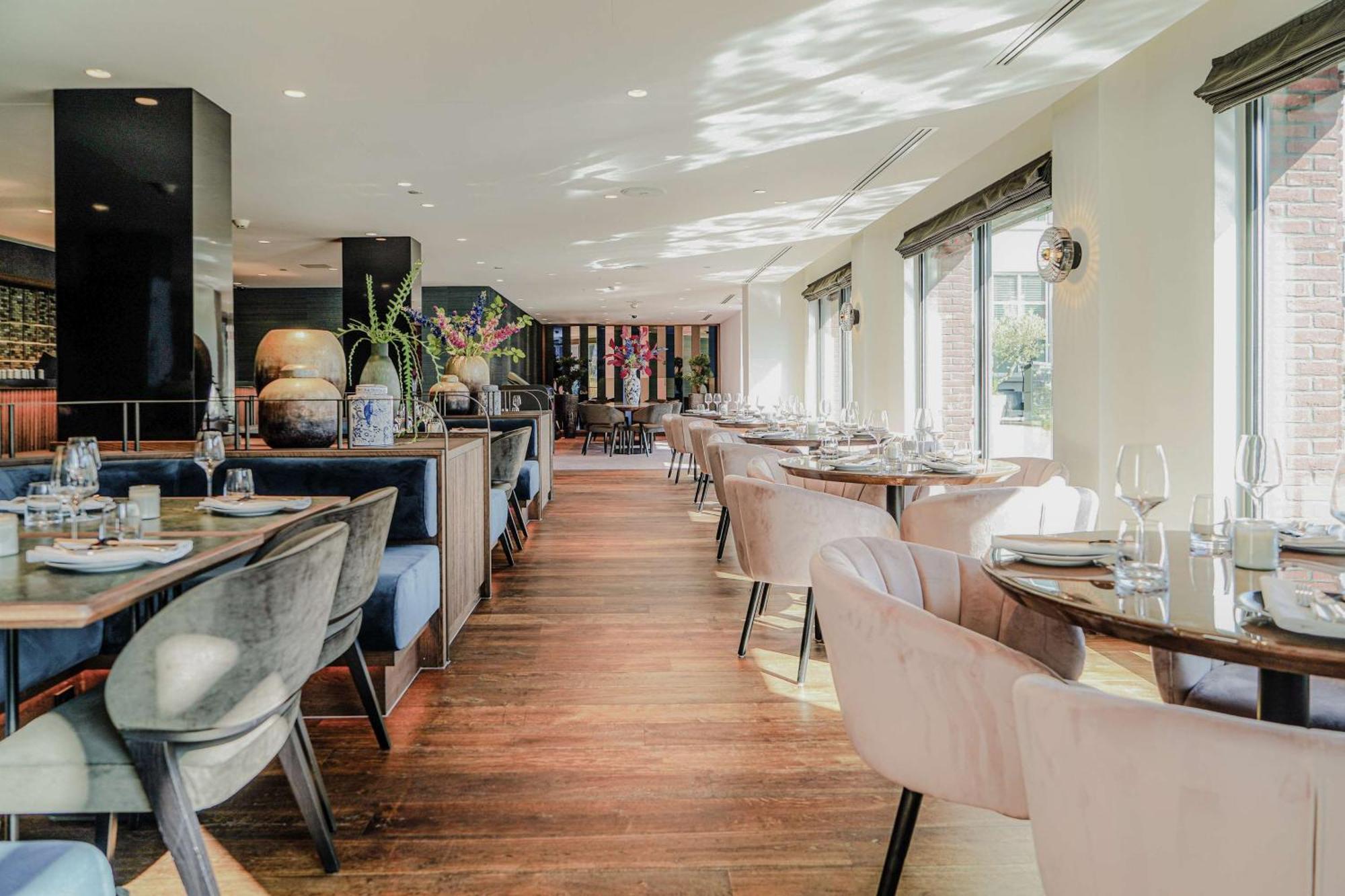 ฮิลตัน เดอะ เฮก Hotel กรุงเฮก ภายนอก รูปภาพ Interior of the restaurant